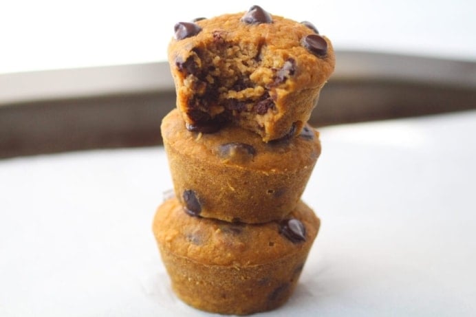 three healthy sweet potato muffins stacked on top of each other